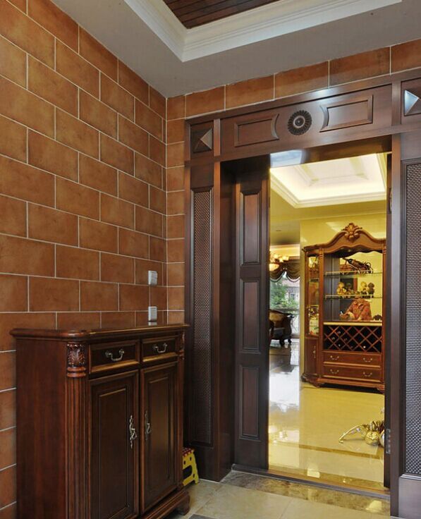 中式古典豪華裝修的大戶型進門效果圖?.jpg